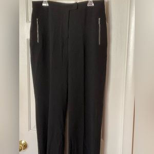 Black trousers with zipper pockets